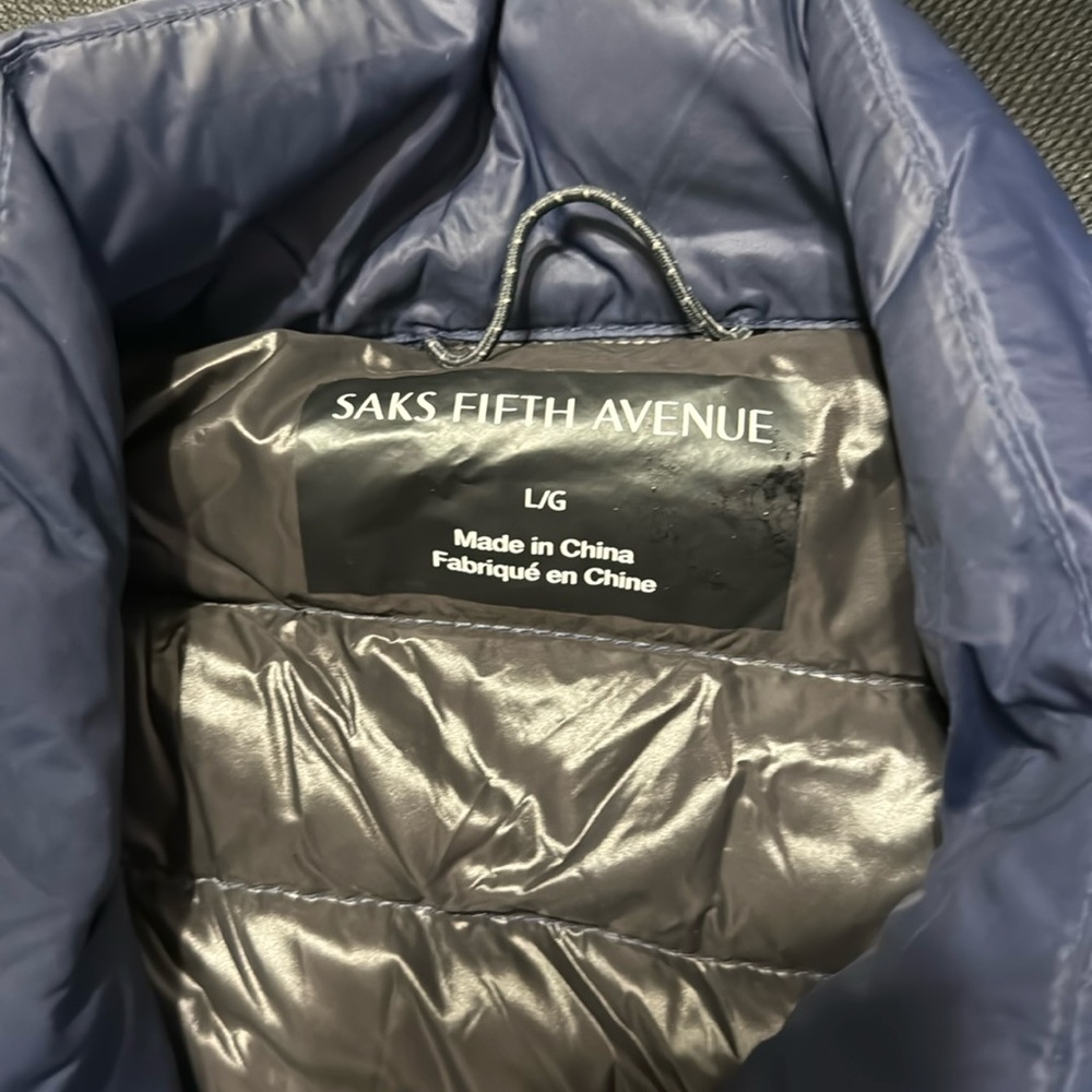 Blue puffy vest from Saks fifth avenue